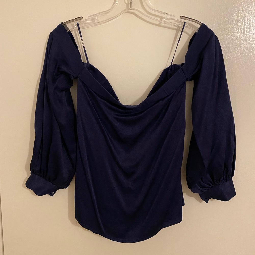 Off the shoulder satin blouse.